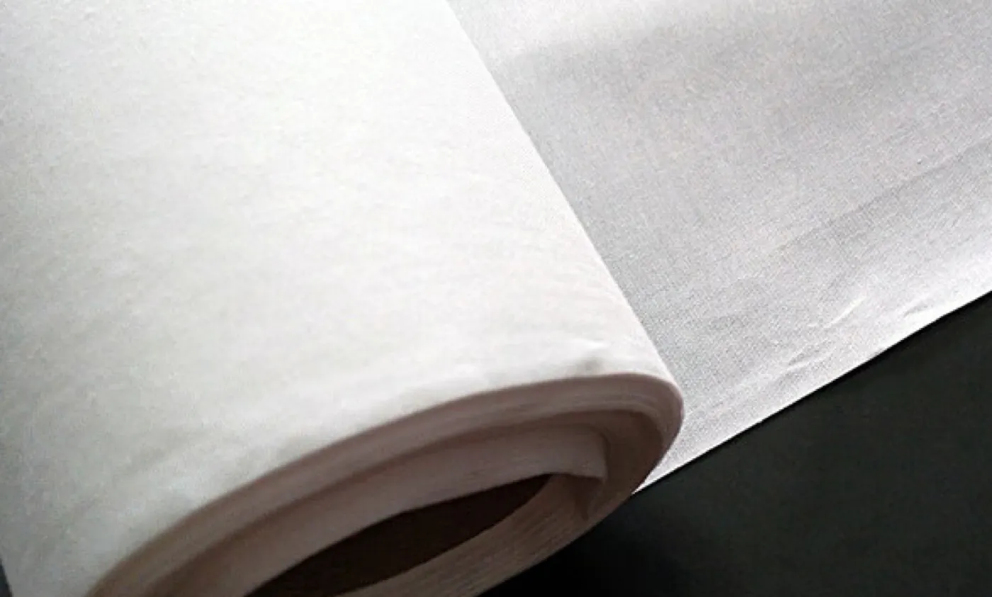 Single / Double-Sided Adhesive Film — material sample photographed on white