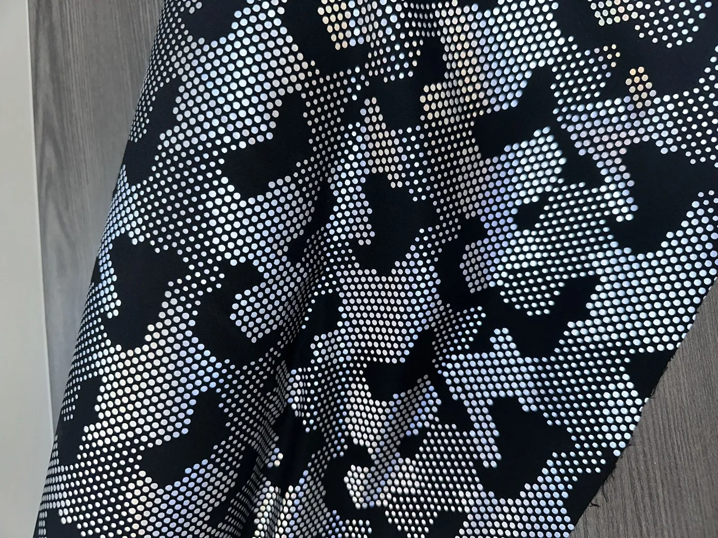 Full-Print Reflective Pattern — material sample photographed on white