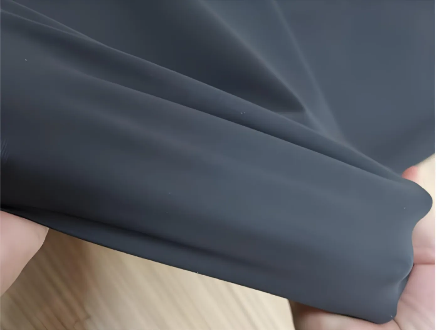 Stretch reflective fabric, silver coated face on a polyester-spandex knit base
